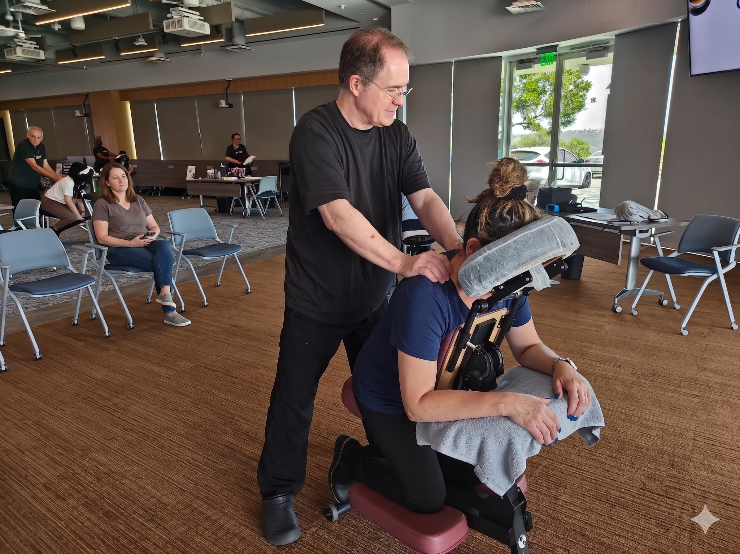 Onsite chair massage at a Houston, TX corporate event